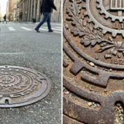 022- TMB Blog Post- Featured-Image-2 Split composition showing a manhole cover: left side shows pedestrians walking past on a city street; right side reveals close-up intricate decorative details including gears, laurel wreaths, and the date 1923